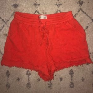 orange fringe shorts